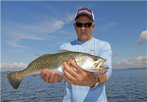 Trout angler holding a large sea trout