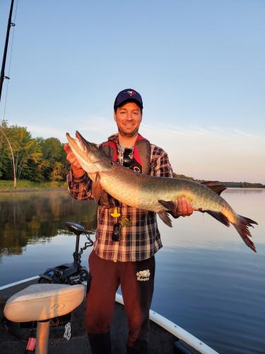 Angler holding a nice muskie he caught