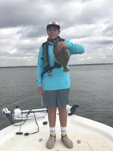 Boy with Flounder catch