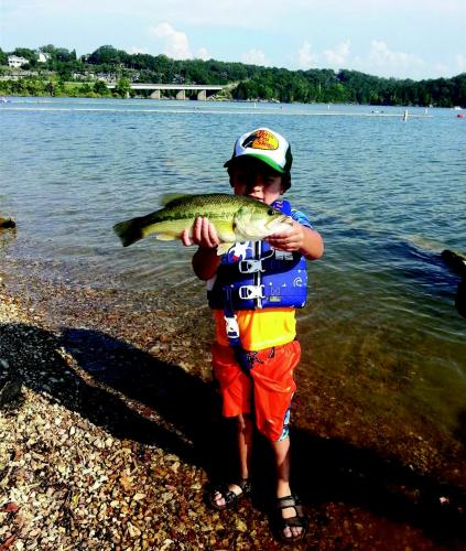 Corbyn loves fishing with his papa, he's holding a bass