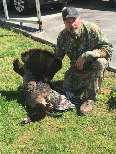Turkey hunter with gobbler