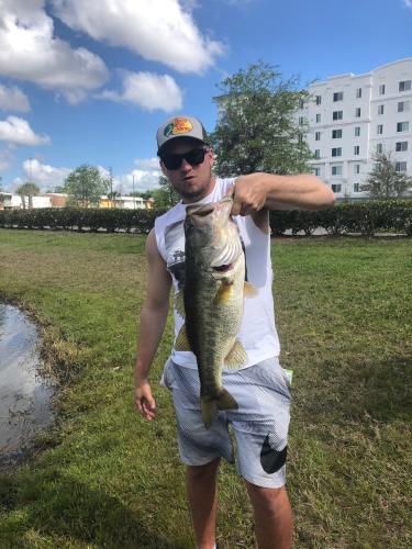 Angler with a large bass