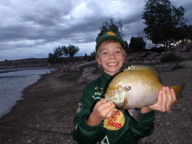 Young angler holding Panfish