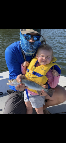 small boy, dad, sea trout