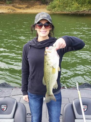 lady angler holding bass