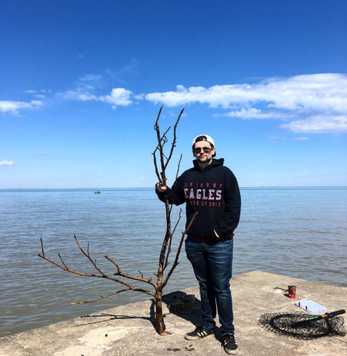 angler with tree branch