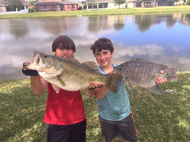 9 lb Bass & 4.5 lb Tilapia Braggin' Board Photo: 9 lb Bass & 4.5 lb Tilapia