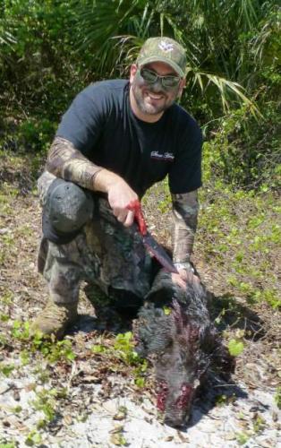 Braggin' Board Photo: Erik with Pig 2
