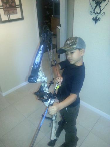 Braggin' Board Photo: Son and his bow