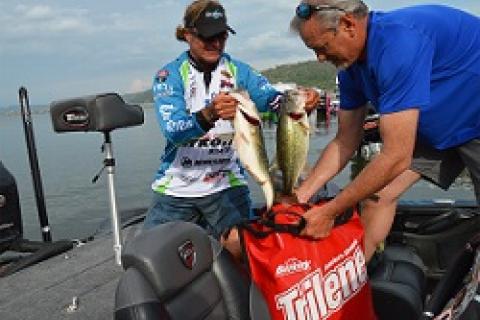 Byron Velvick bagging bass at Lake Guntersville by Byron Velvick bagging bass at Lake Guntersville...