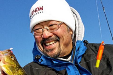 Ted Takasaki with a jumbo perch caught on Lake Poinsett, South Dakota. by Ted Takasaki with a jumbo perch caught on Lake Poinsett, South Dakota....