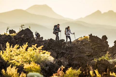 Two hikers on a mountain 