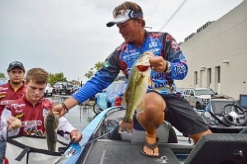 Reigning FLW Tour AOY Scott Martin bagging his catch at the 2015 Forrest Wood Cup by Reigning FLW Tour AOY Scott Martin bagging his catch at the 2015 Forrest Wood Cup...