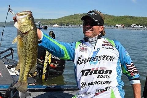 Byron Velvick at work on Lake Guntersville in Alabama. by Byron Velvick at work on Lake Guntersville in Alabama....