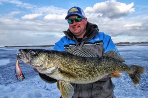 The author Jason Mitchell with a nice late ice walleye