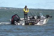Angler fishing in a Tracker boat