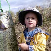 A boy and his first fish!