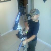 Son and his bow