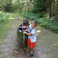 Headed to a Back Woods Lake With The Golden Hawk Canoe