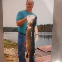 Jerry with a 44" 28 Lb Pike released