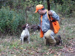 Grouse hunter & dog
