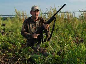 Bird hunter in a field