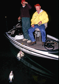 Two crappie anglers night fishing