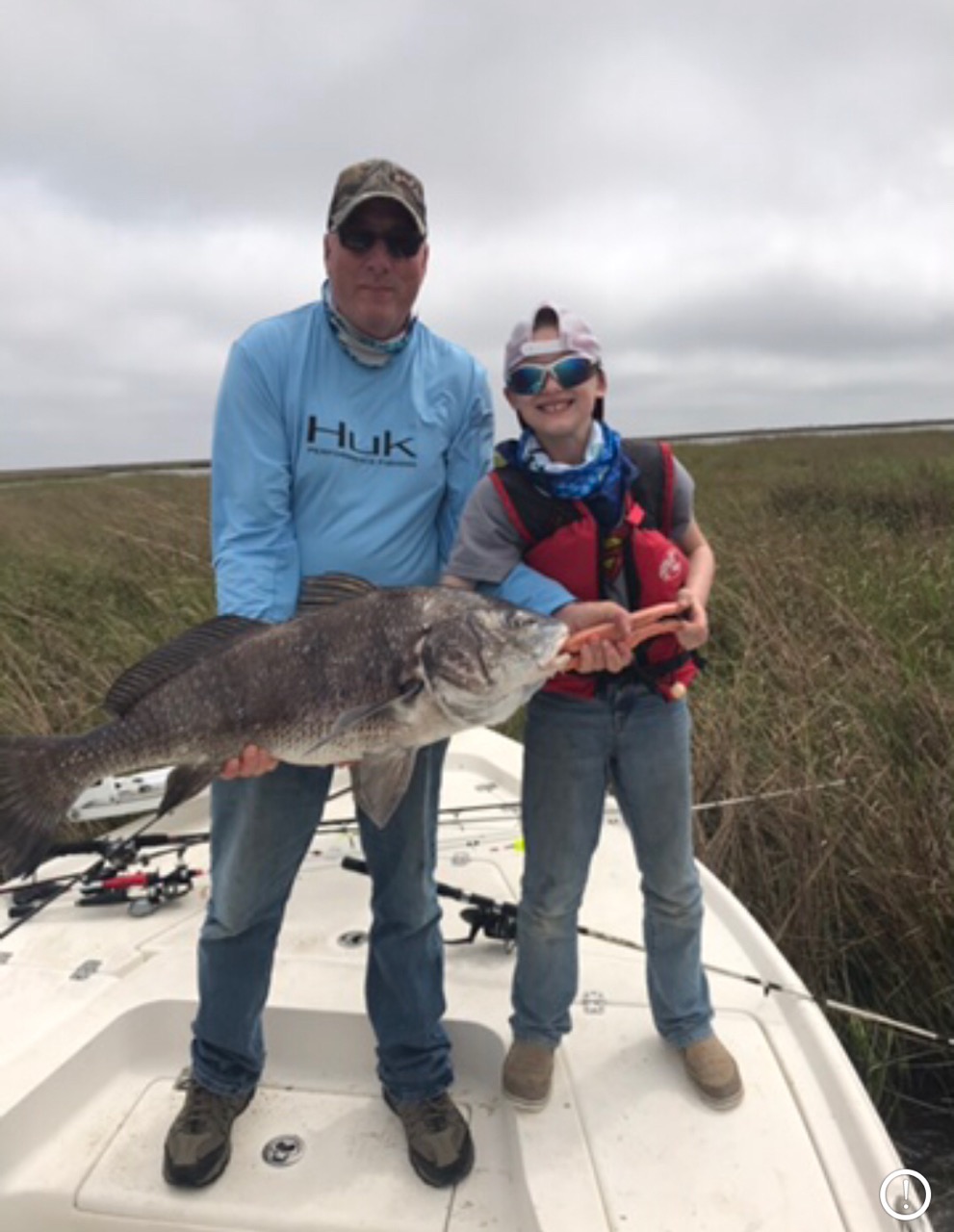 Papa John and Grandson Brantly with black drum 