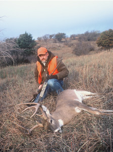 Hunter And Deer