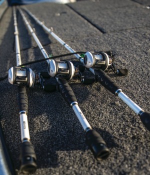 Rods and reel combos on the deck of a boat