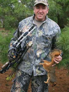 Small game hunter with a squirrel