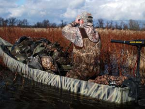 Waterfowl hunter in boat