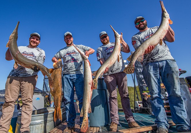 Anglers holding tournament catches