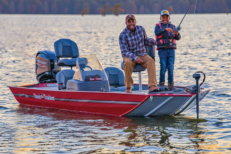 Father and son fishing from a Bass Tracker