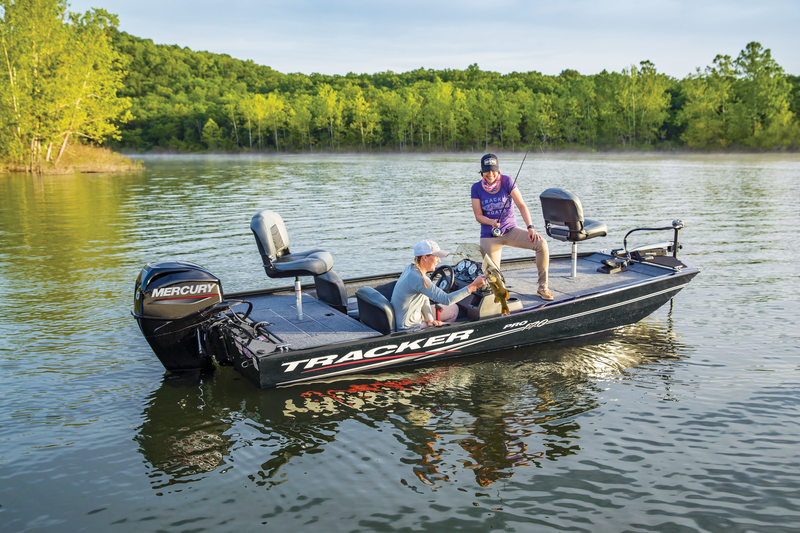 Two anglers bass fish from a Tracker boat