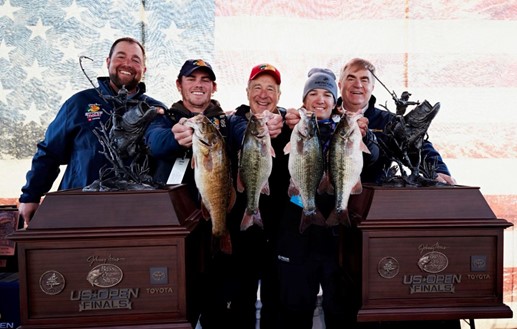 Winners of US Open holding tournament winning fish