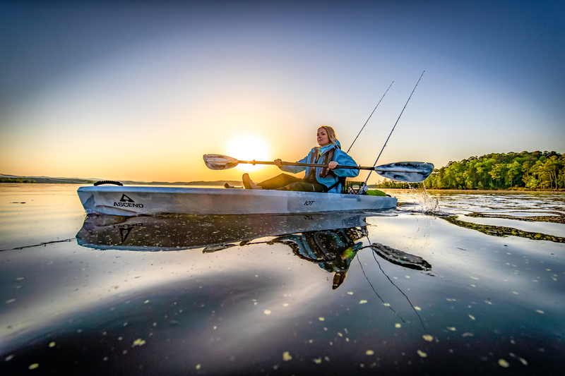 woman in ascend 10t kayak on lake