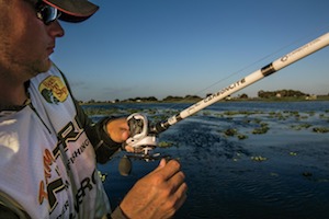 A baitcast reel rigged to a fishing rod