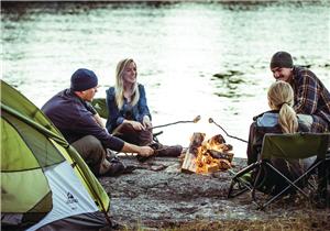 campers roasting campfire water fall