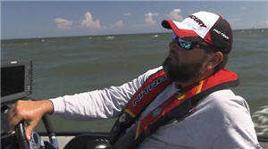 Greg Hackney driving boat