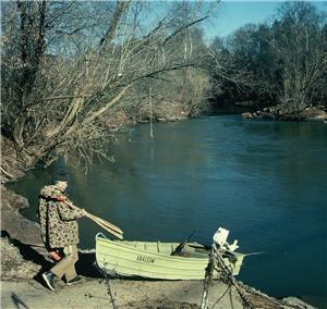 hunter boarding boat river