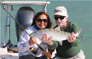 Two anglers with bonefish