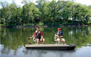 Two boys fishing on a pond