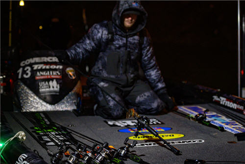 Bradley Roy preps his rods before morning take-off.
