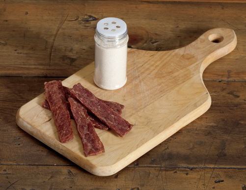 Strips of basic jerky meat on a cutting board