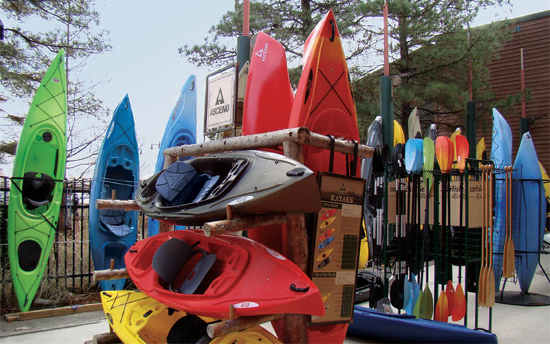 Kayaks stacked upright at Bass Pro store
