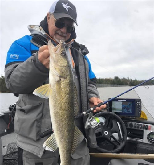 Steve Worrall With a Spring Time Walleye