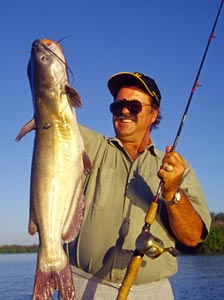 Angler fishing for catfish at lake Dominquez