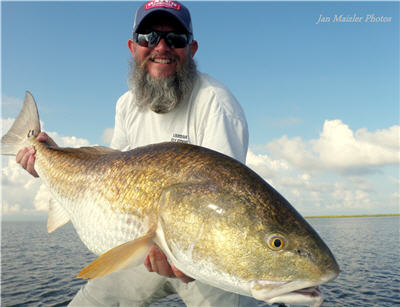 This might be the biggest Redfish ever caught our reels…