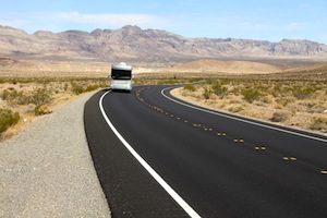 RV driving down a remote road